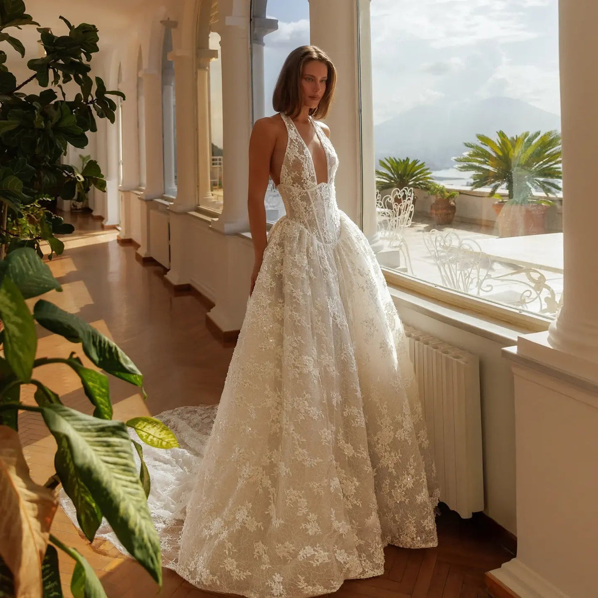 Modern Ivory Lace Deep V-Neck Halter Ball Gown Wedding Dress with Train ZP119