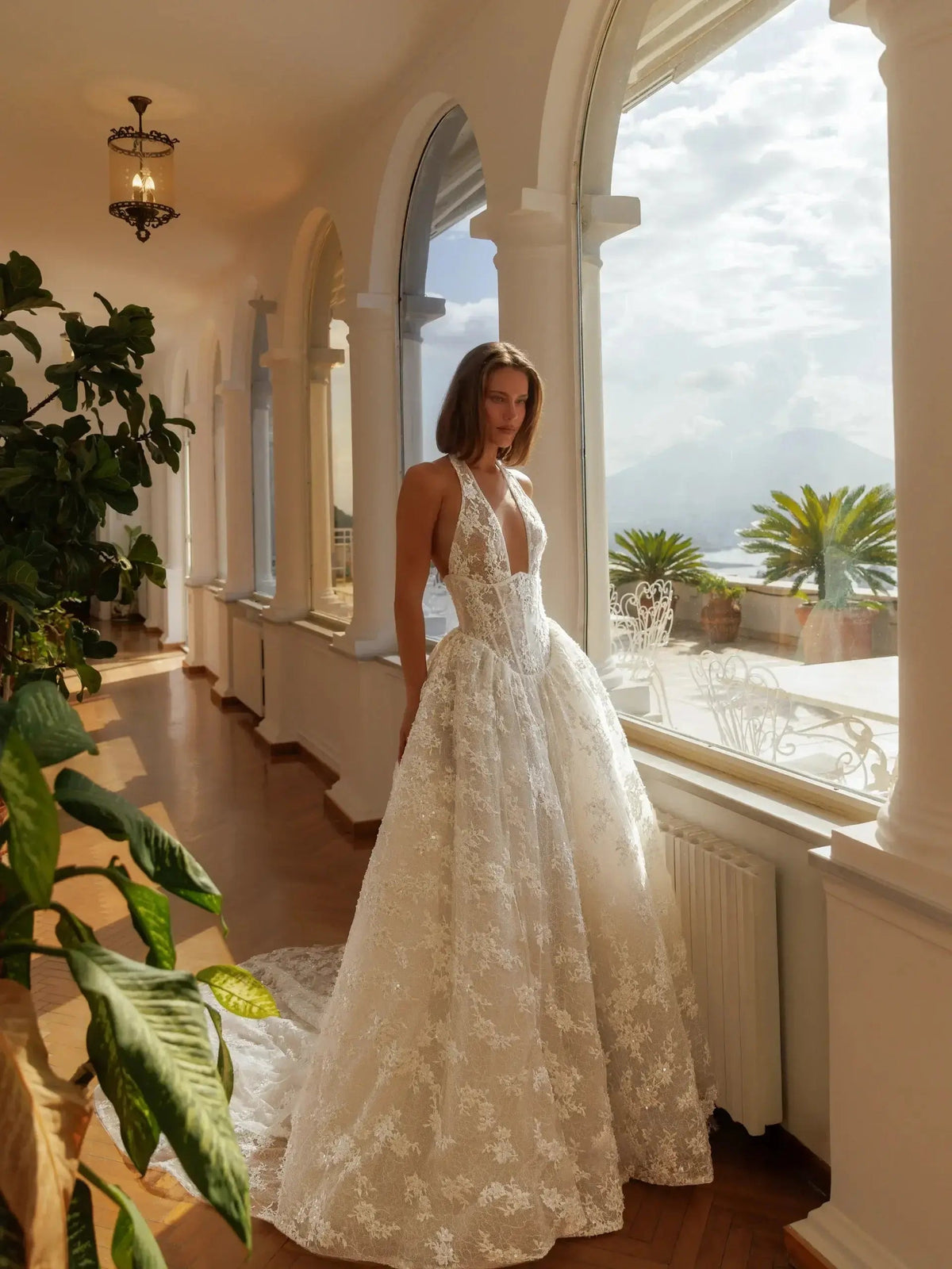 Modern Ivory Lace Deep V-Neck Halter Ball Gown Wedding Dress with Train ZP119