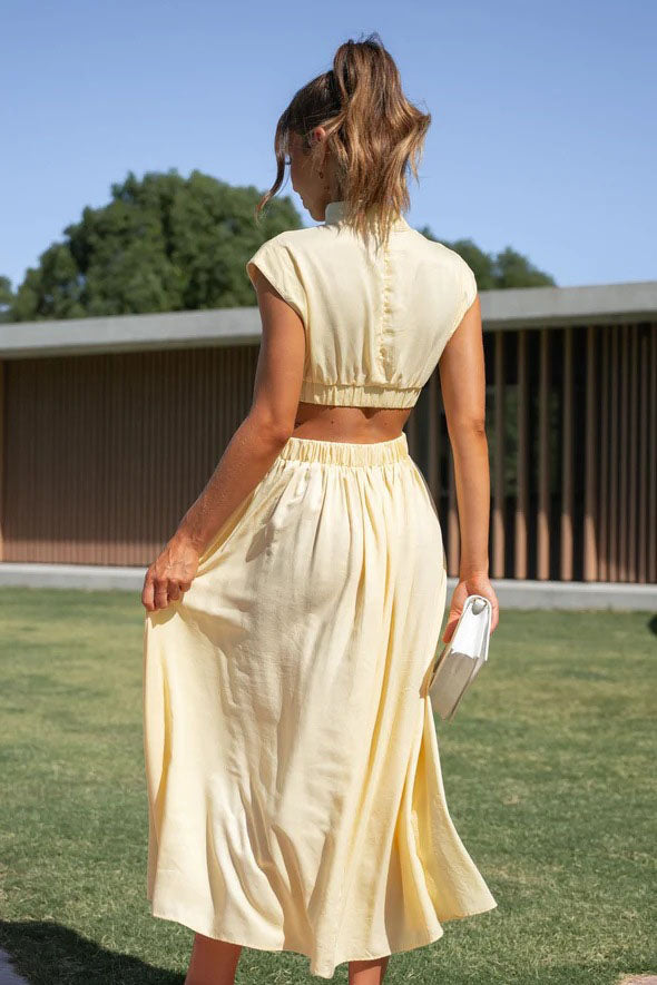 Effortless Rafaela Holiday Midi Dress with Cut Out Waist and Pockets Chic Silhouette Collection