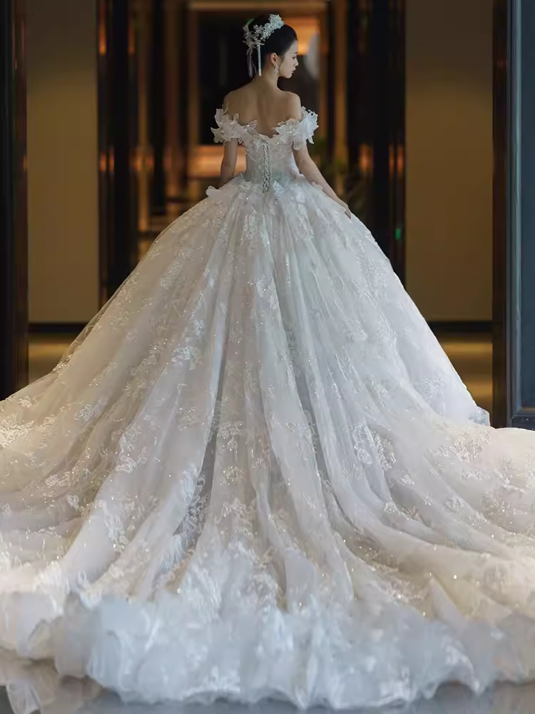 Luxury Ball Gown Off-the-Shoulder Short Sleeves White Lace Wedding Dress - View 2 | FashionDia