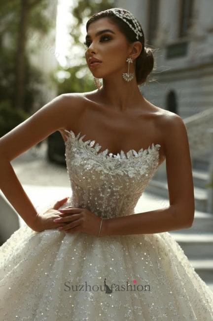 Strapless Sleeveless Beaded Ball Gown Lace Up Cathedral Train Bridal Gown With Appliques