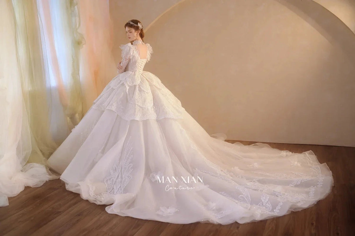 Regal Ivory High-Neck Lace Ball Gown with Sheer Sleeves, Ruffled Details & Crystal Embroidery (ZD16937)