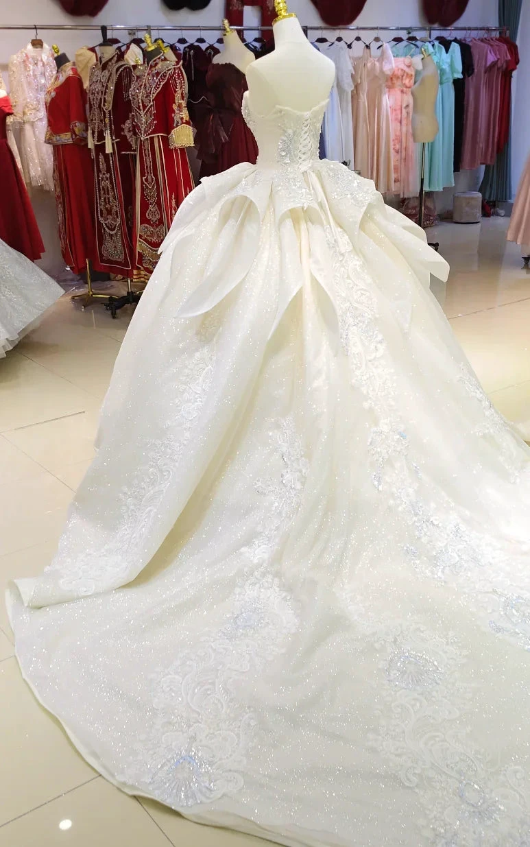 Ivory Glimmer Strapless Ballgown: Iridescent Beaded Bust & Flowing Train (ZD16774)