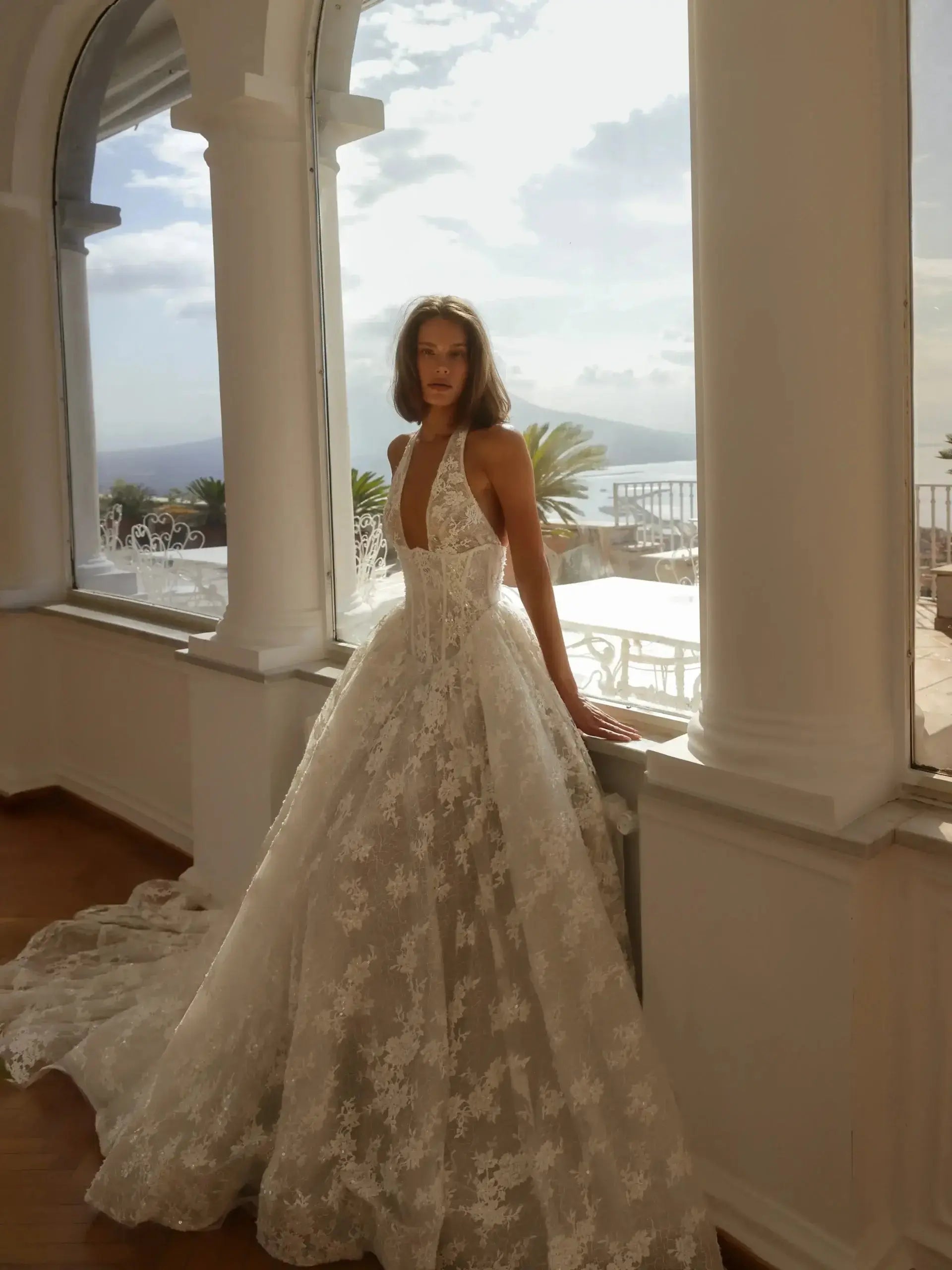 Modern Ivory Lace Deep V-Neck Halter Ball Gown Wedding Dress with Train ZP119