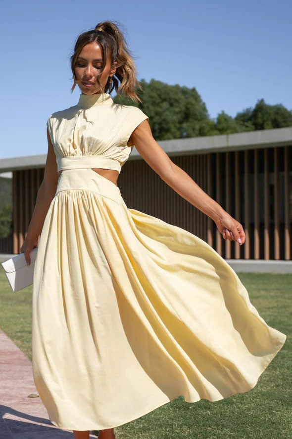 Effortless Rafaela Holiday Midi Dress with Cut Out Waist and Pockets Chic Silhouette Collection