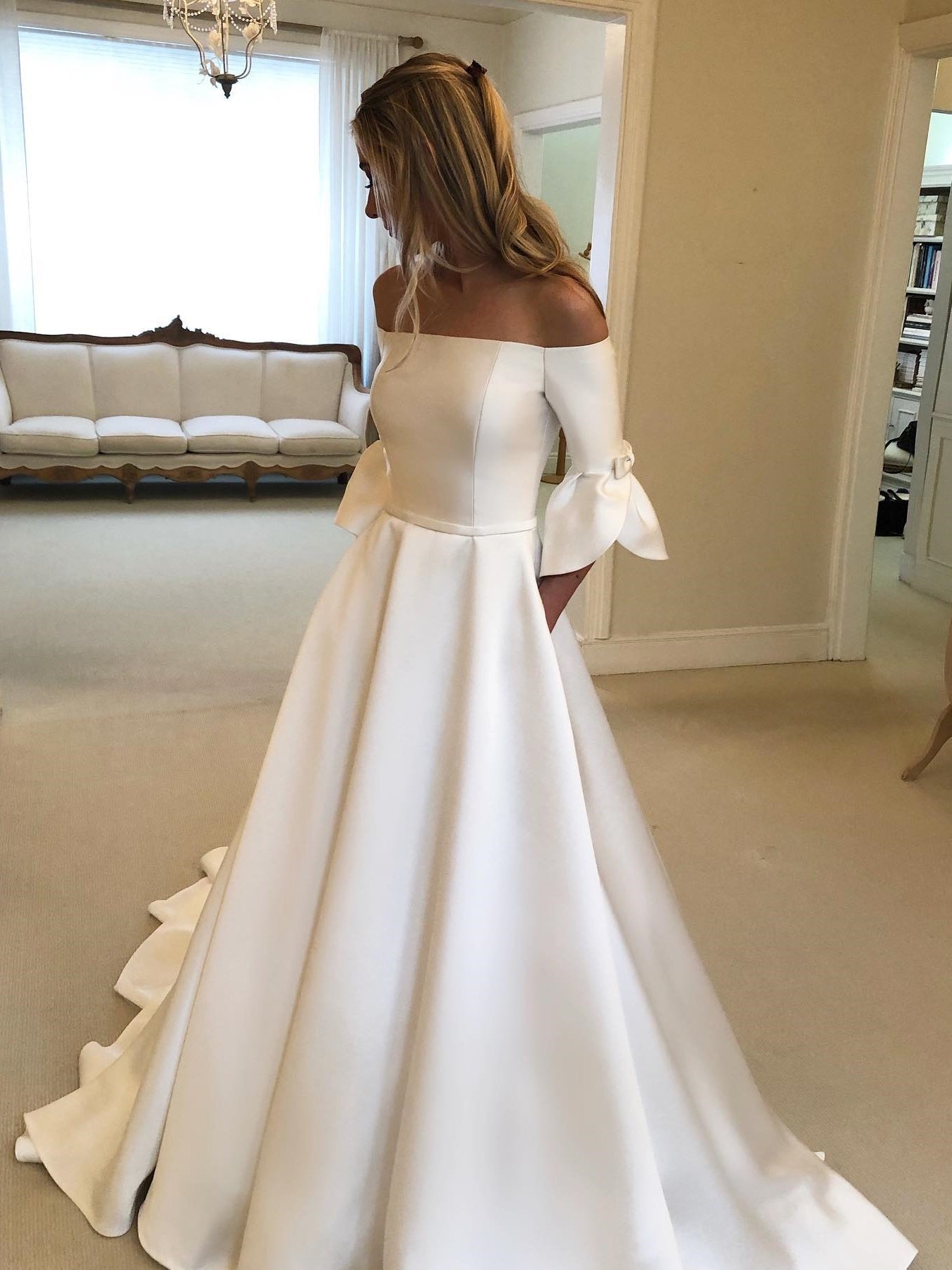 Off Shoulder Flared Cuff Sleeve Satin Bridal Ball Gown With Button Back