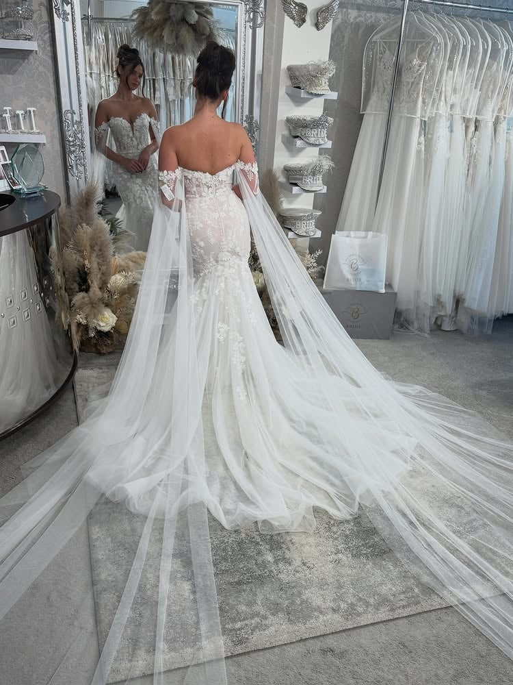 Off Shoulder Lace Mermaid Wedding Dress With Flowing Tulle Cape Sleeves And Chapel Train