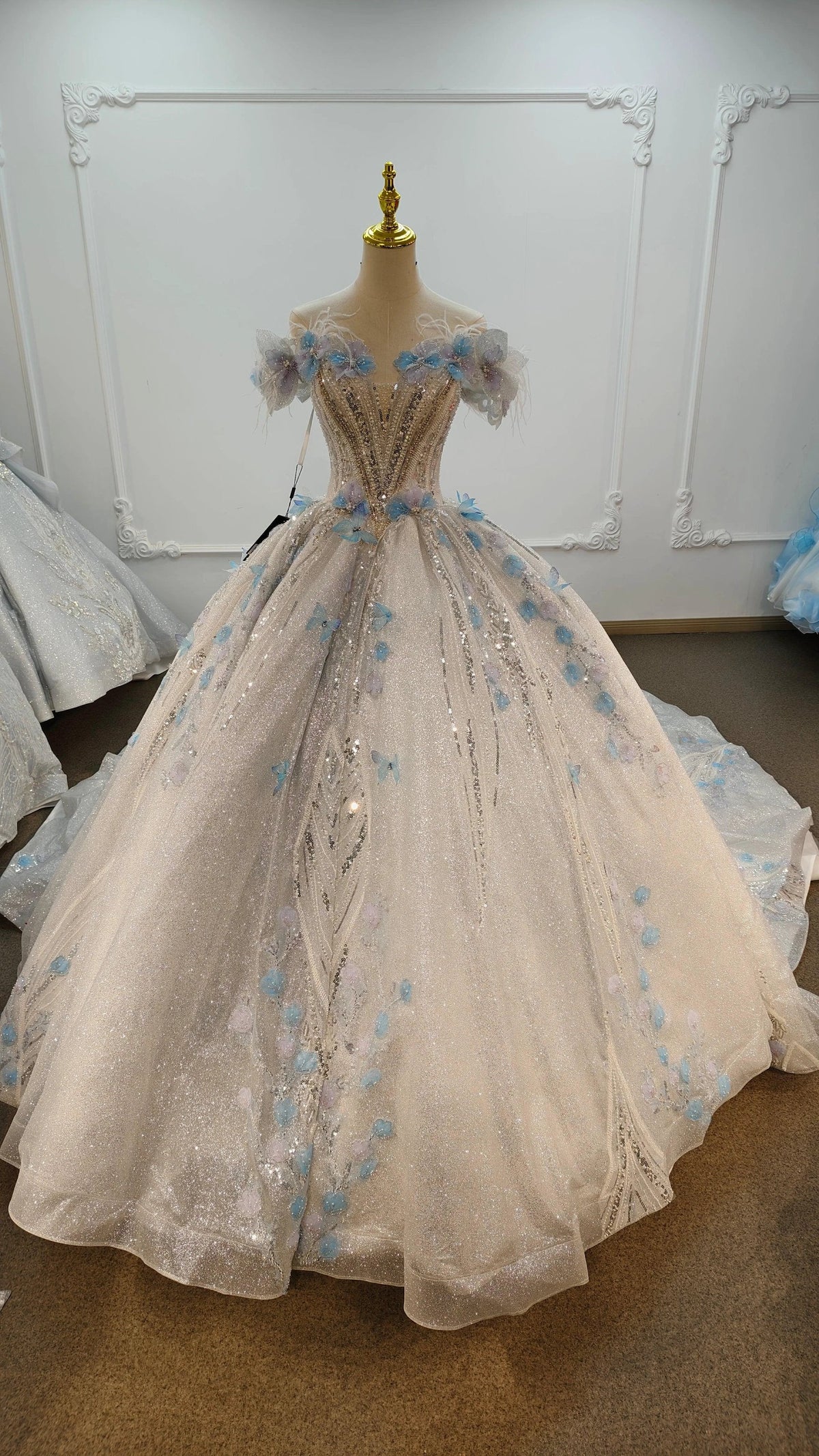 Ethereal Off-the-Shoulder Ball Gown Wedding Dress with Sequin Tulle, 3D Pastel Florals & Feather Accents Ye-2028 by ZAPDRESS