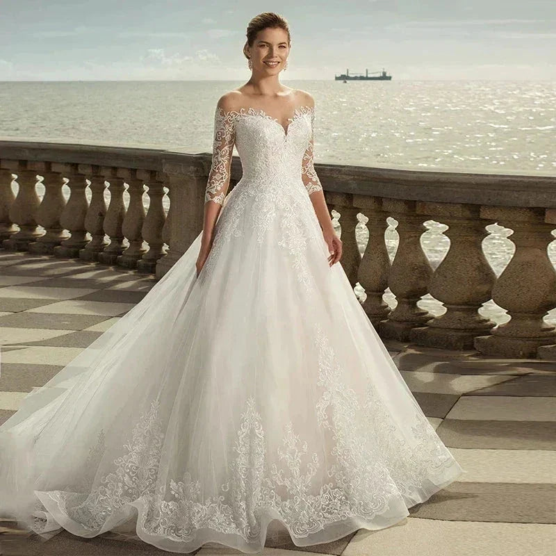 MACDUGAL Exquisite Three-Quarter Sleeves Mopping O-Neck Lace Charming Applique Back Lace Double Button Wedding Dress (ZD14268)