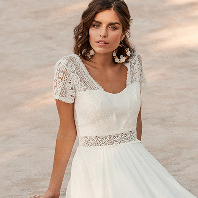 White Sheer Back Beach Wedding Dress - Fashionpara