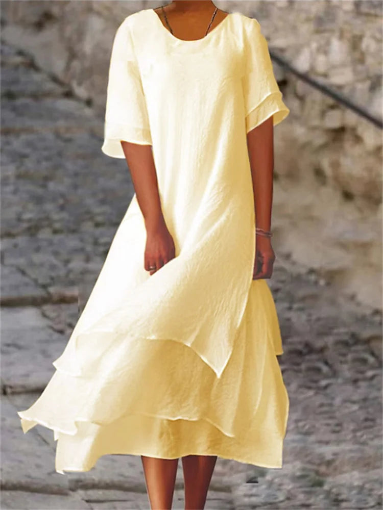 Eva Effortless Double Layered Slit Short Sleeved Dress with Round Neck Statement Occasion Edit