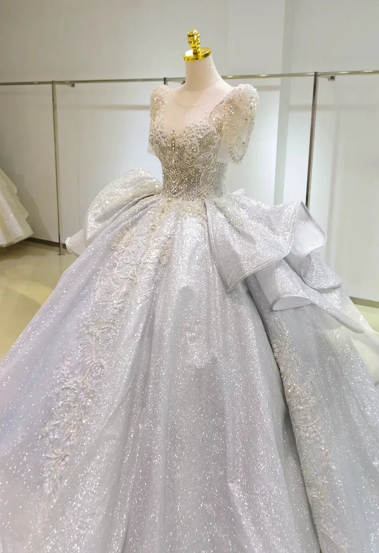 Silver Glimmer V-Neck Ballgown: Crystal-Embroidered Bust & Dramatic Bow Train (ZD16773)