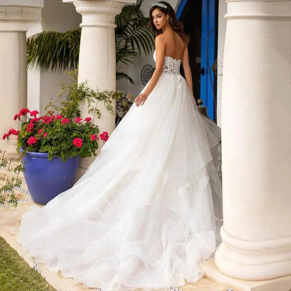 Backless Princess Sequined Beading Bodice Luxury Bridal Gown Sweetheart Lace Appliques Puffy Organza Wedding Dress Robe de Marie (ZD13367)