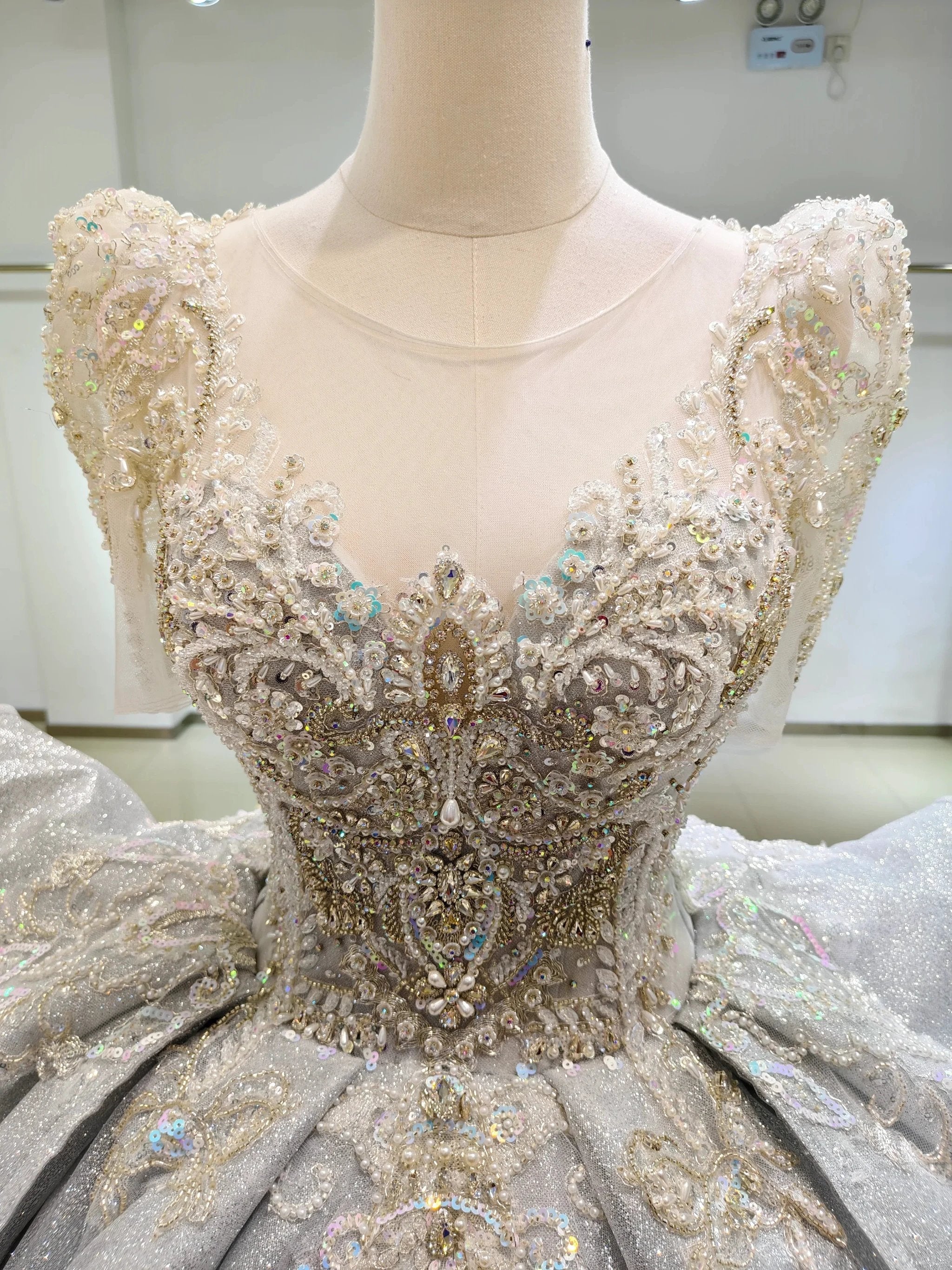 Silver Glimmer V-Neck Ballgown: Crystal-Embroidered Bust & Dramatic Bow Train (ZD16773)