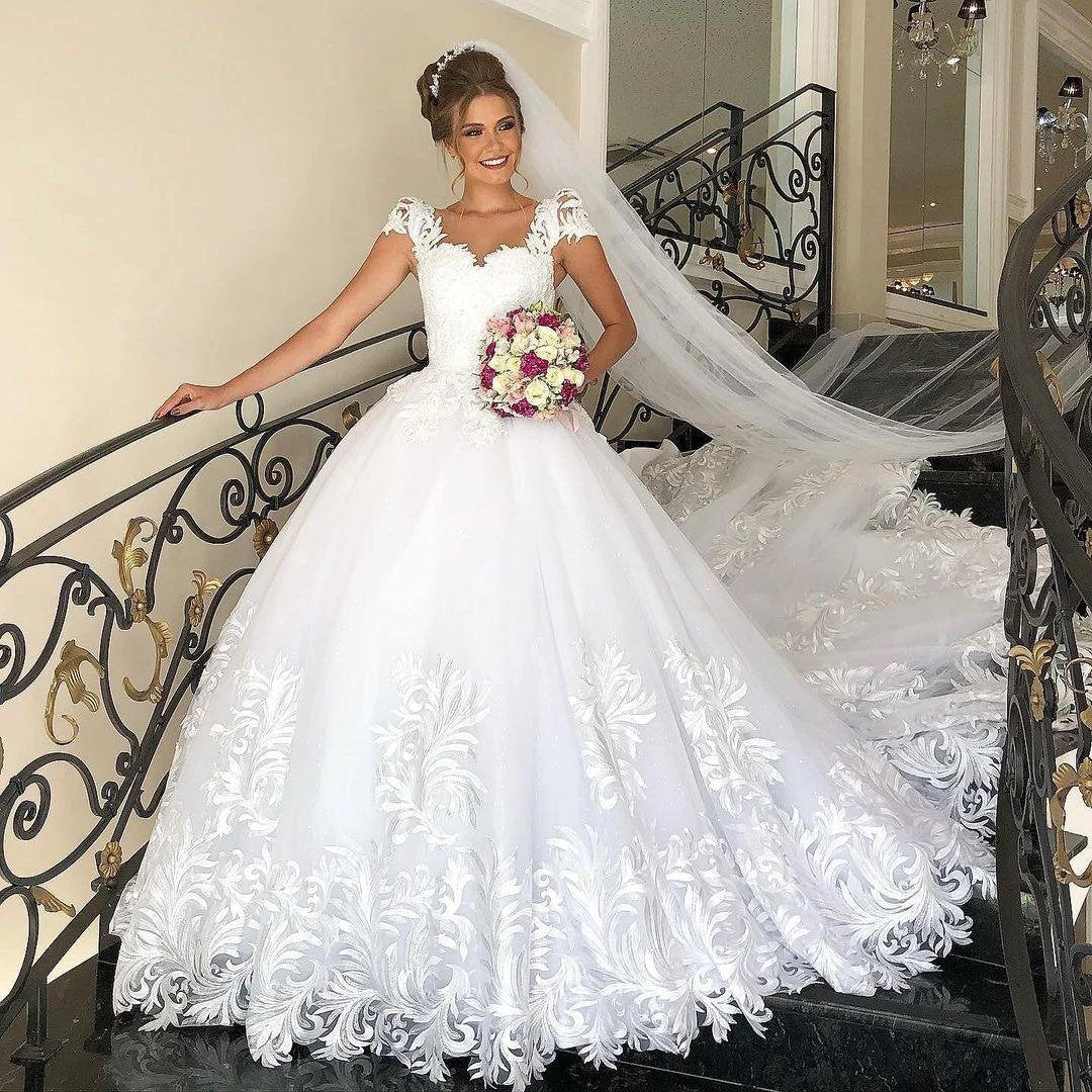Elegant Long Princess Tulle Lace Wedding Dress with Cap Sleeves (ZD15025)