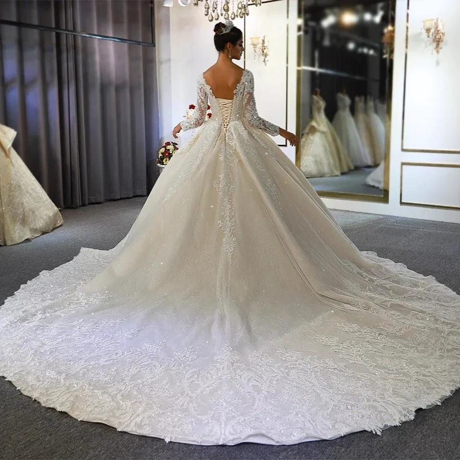 Long A-Line Sweetheart Backless Appliques Lace Sequins Wedding Dress with Sleeves (ZD15099)
